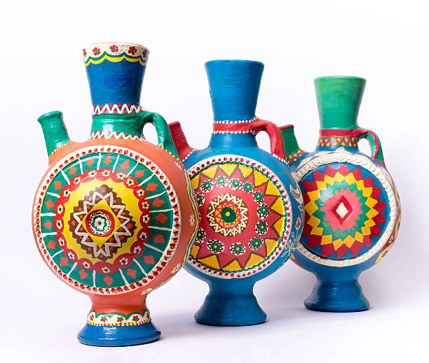 istock Three decorated colorful handcrafted pottery jugs 599754190