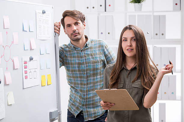 istock Brainstorming pair of coworkers 599756208