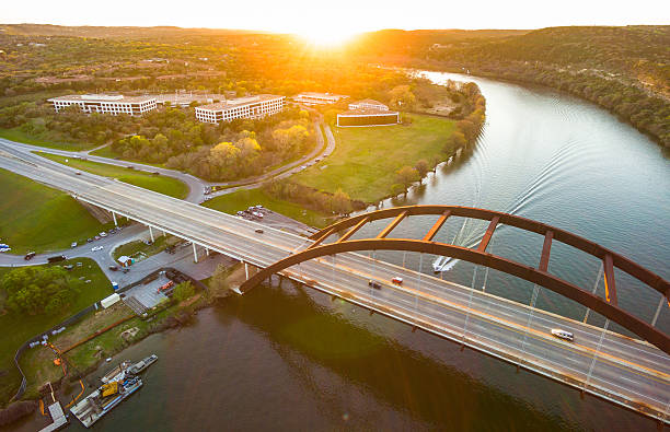 istock Sunrays Over Pennybacker Bridge Austin Texas Landmark at Sunset 599756552