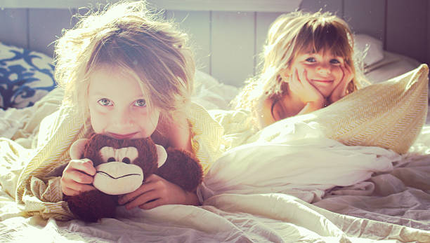 Good Morning Girls Two little girls in the early morning light sister photos stock pictures, royalty-free photos & images