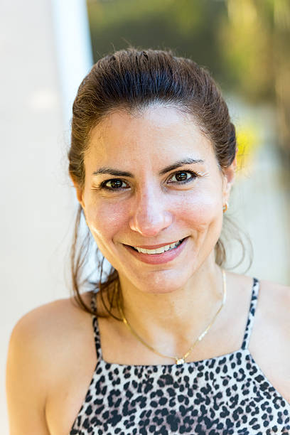 istock Mature hispanic woman smiling 599763096