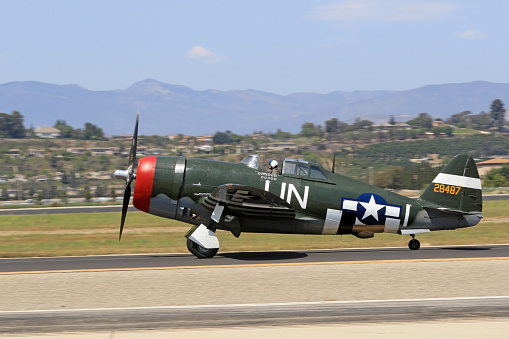 Camarillo, California, US- August 20,2016. Vintage WWII P-47 Thunderbolt on the runway at the 2016 Camarillo Air Show outside of Los Angeles. The 2016 Camarillo Air Show features many vintage, restored WWII aircraft performing for the public.