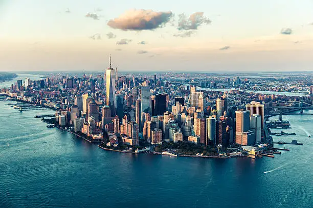 Image of the Manhattan skyline at sunset from an elevated angle.