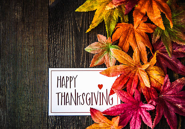 istock Fall leaves background with Happy Thanksgiving message 599768646