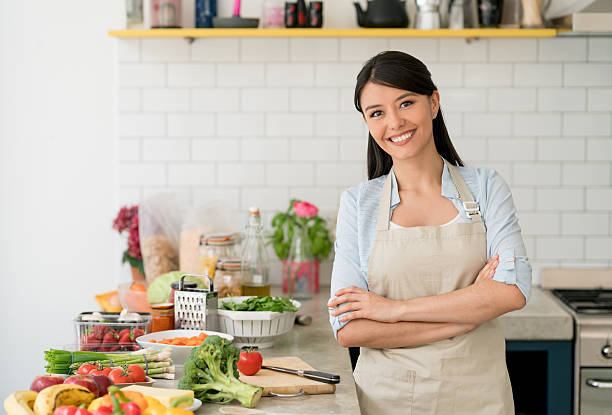 istock Housewife making dinner at home 599768744