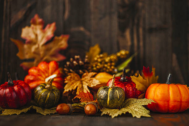 istock Thanksgiving still life background with pumpkins and acorns 599770142