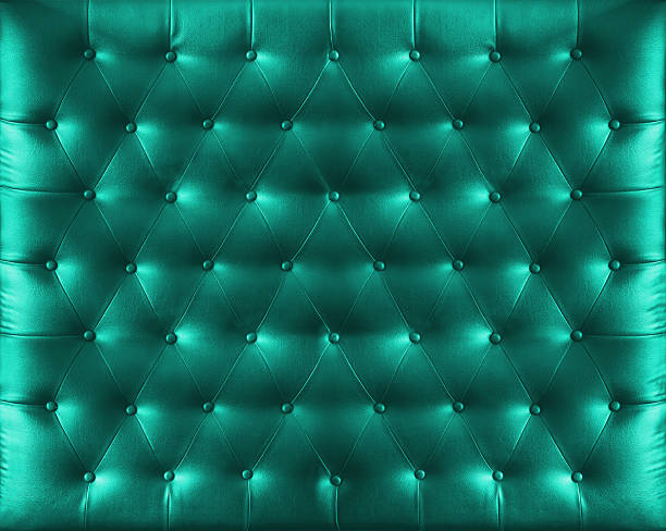 istock Close up retro chesterfield style, Green capitone textile background 599771816