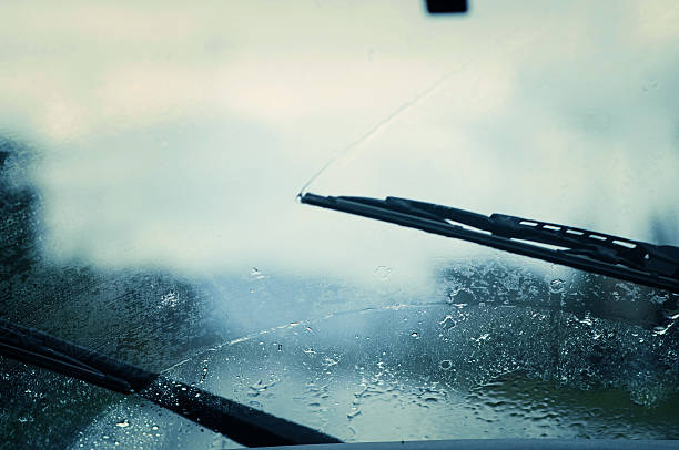 Car windshield wipers. Car windshield wipers in the rainy weather. traffic jam. windshield wiper photos stock pictures, royalty-free photos & images