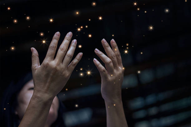 istock Respect and pray and stardust on city at night background 599776326