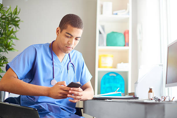istock doctor checking social media 599777470