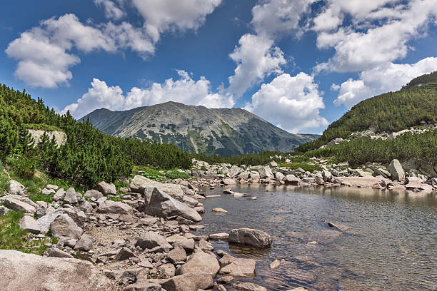 istock Upper Muratovo lake and Todorka peak, Pirin Mountain 599778746