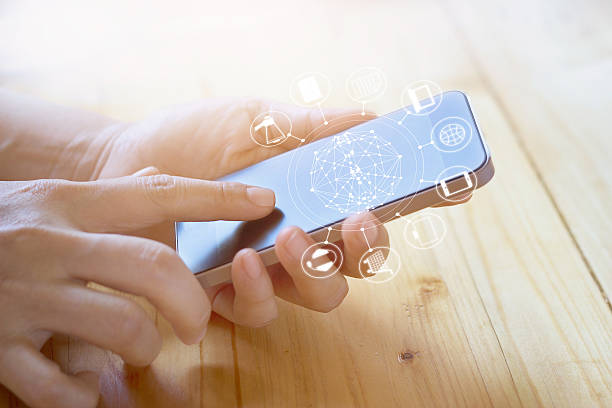 istock woman using mobile payments, holding circle global 599780750