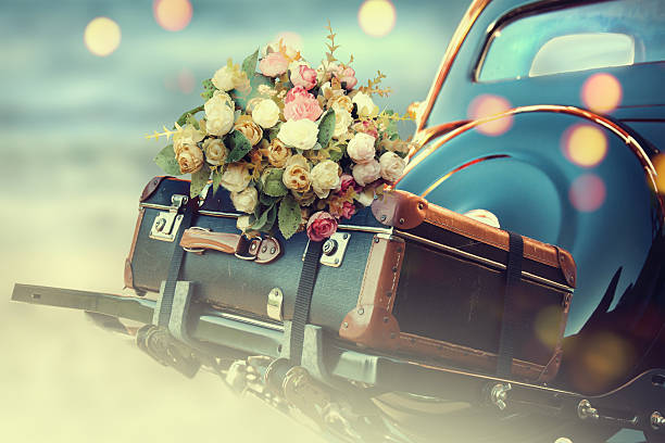 Wedding bouquet on vintage wedding car
