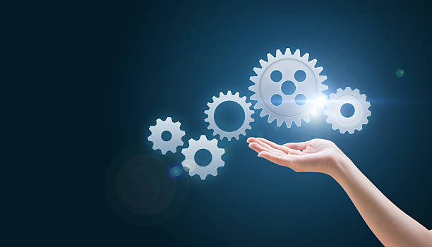 istock Hand supports the gear mechanism 599782484