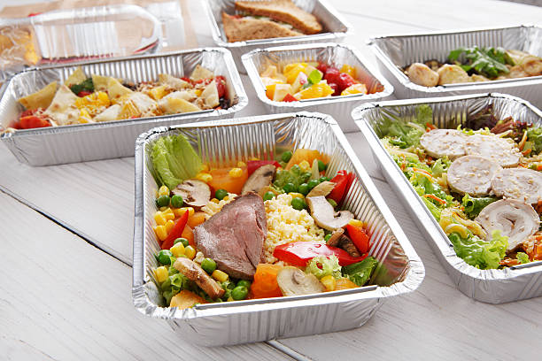 istock Healthy food in foil boxes, diet concept. 599782804