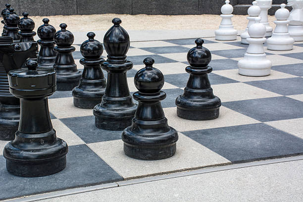 istock Black and white street chessmen 599784618