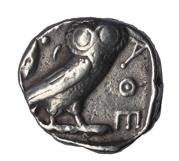 Tetradrachm of Athens, IV century BC Tetradrachm of Athens, IV century BC Reverse: Owl and legend ATHE (Athens) ancient coins of greece stock pictures, royalty-free photos & images