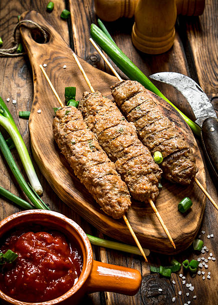 istock Kebab with tomato sauce and spices. 599786768