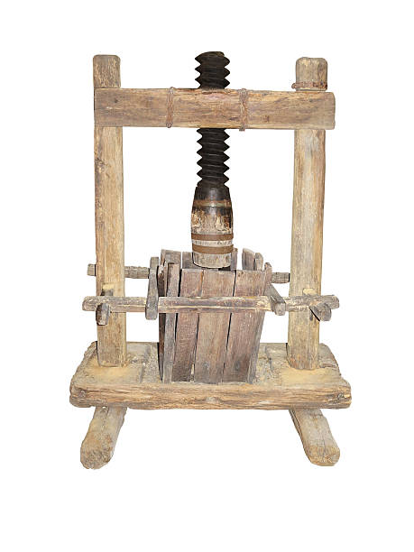 istock Ancient wooden wine press isolated on white background 599791818