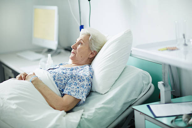 istock Senior female in hospital 599794326