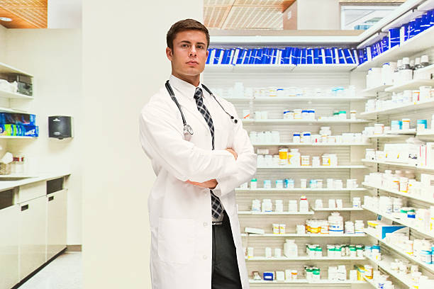 istock Doctor standing in drug store 599867016