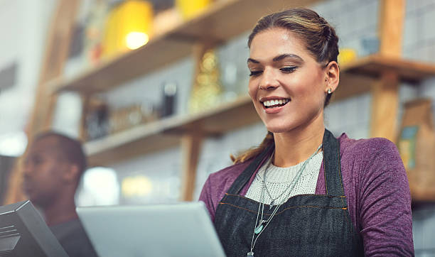istock Managing her store online and in store 599868408