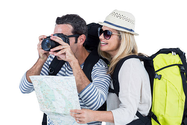 istock Man photographing while standing by woman 599873226