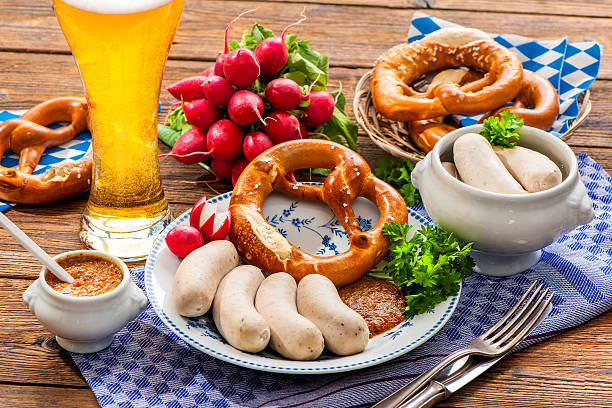 White sausages with sweet mustard and pretzel Traditional Bavarian meal. White sausages with sweet mustard and pretzel weisswurst photos stock pictures, royalty-free photos & images