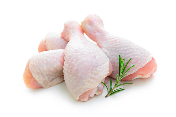 Raw chicken legs stock photo