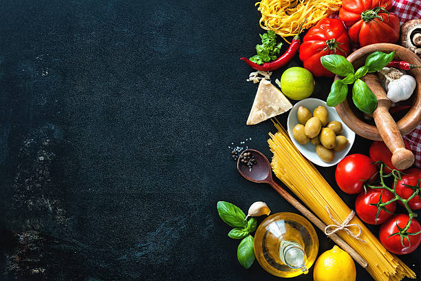 istock Italian food ingredients on slate background 599879492