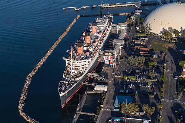Long Beach, California, USA - August 16, 2016:  Aerial view of the historic Queen Mary cruise ship hotel and event center.  