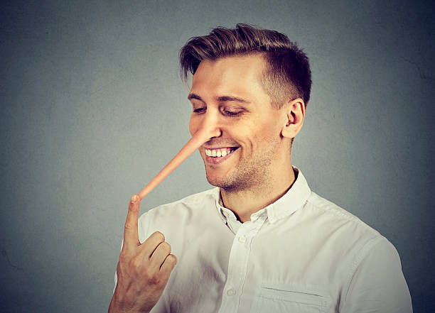 istock Man with long nose. Liar concept 599882164