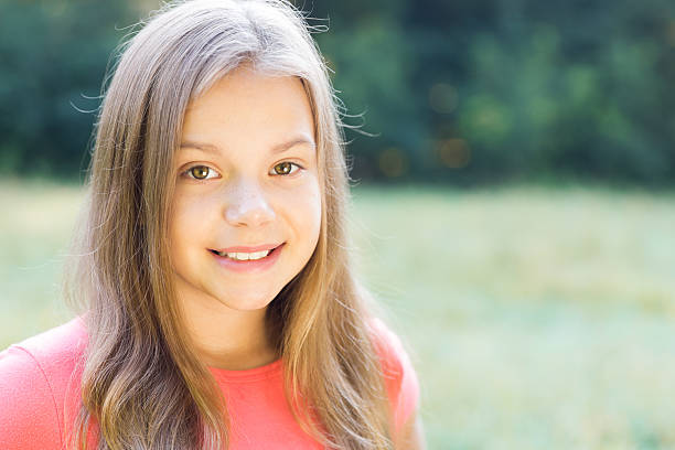 istock Beautiful young girl smiling 599882784