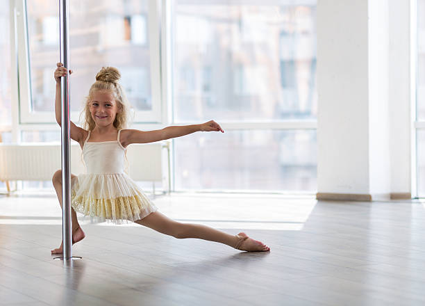istock Beautiful little dancer in a dance studio 599884256