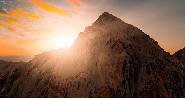istock mountain view with snow silhouette at sunset scene 599889752