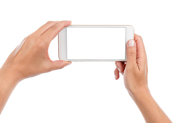 istock Taking Photo or Selfie with Mobile Phone Isolated 599889870