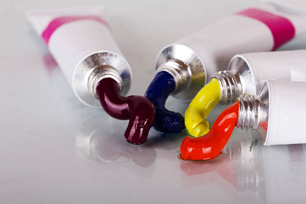 istock Open tubes with coloured paint coming out 599891290