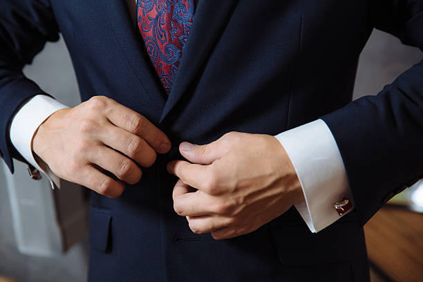 istock man wears a jacket. concept of business 599891934