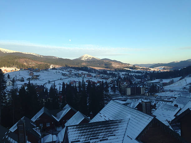 istock winter village snow. snowy roof 599893060