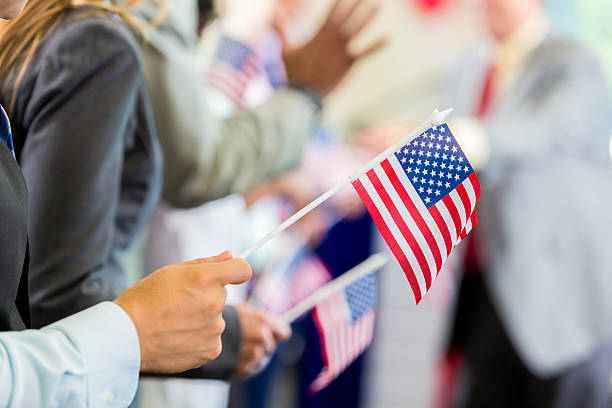 istock Political supporters waving flags during rally or speech 599893726