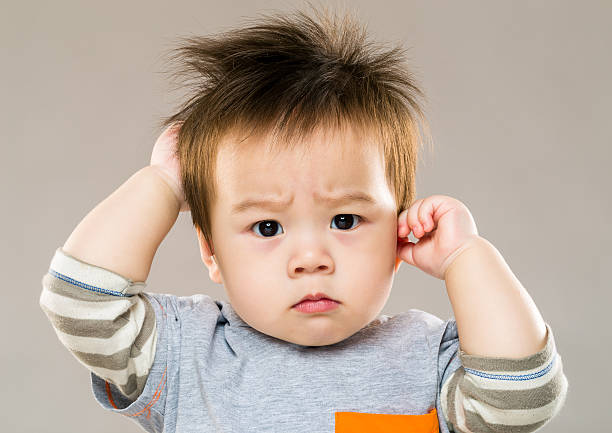 Portrait of Chinese boy Portrait of Chinese boy confusion in babies stock pictures, royalty-free photos & images