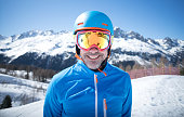 Happy adult man skiing