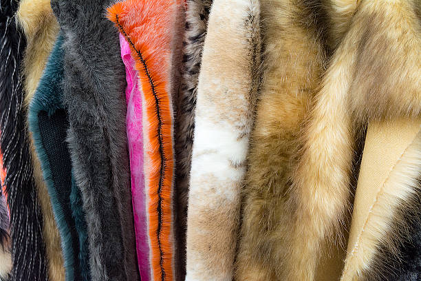 istock Different faux fur fabrics on  a rack outside 599898100