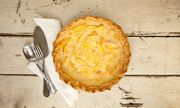 istock Peach Pie on Old White Wood Background 599898710