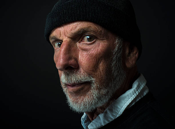 istock Serious Old Guy, Low-Key Grunge Lighting, Senior Man, Gothic Style 599899314