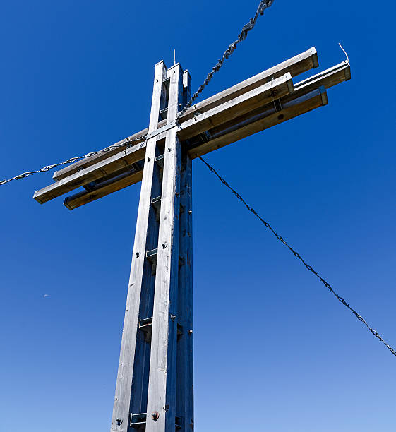 istock peak cross at the mountain Golzentipp 599899436