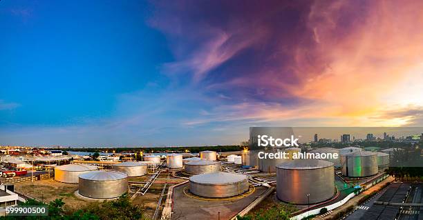 Industrial Oil Tanks In A Refinery At Twilight Stock Photo - Download Image Now - Storage Tank, Farm, Agriculture