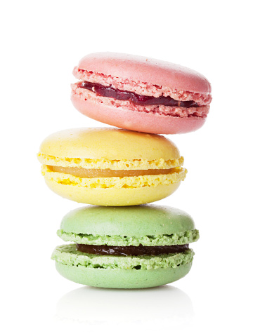 Colorful macaroons stack. Sweet macarons. Isolated on white background