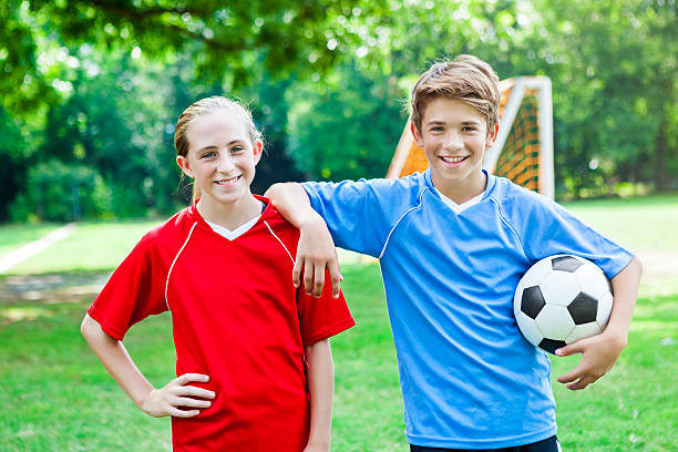 istock Friendly opposing team soccer players before game 599902412
