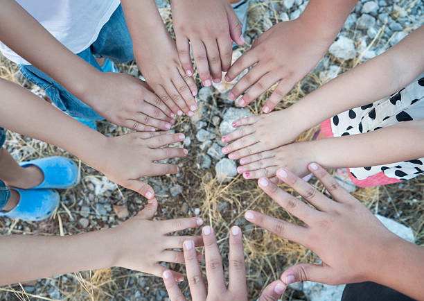 Group of children holding hands